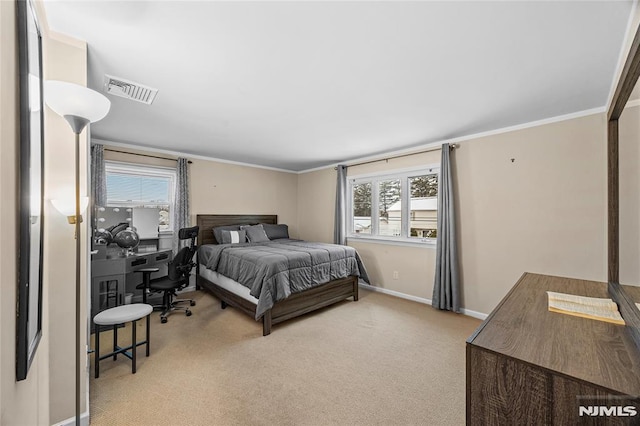 carpeted bedroom with ornamental molding