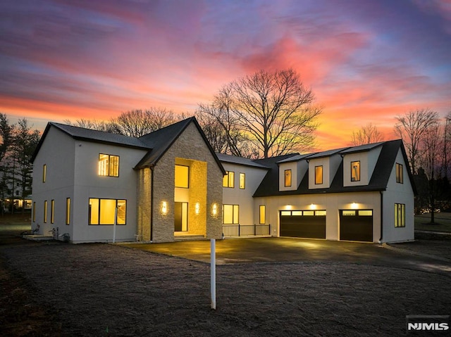 view of front of property featuring a garage