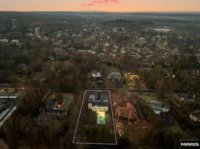 view of aerial view at dusk