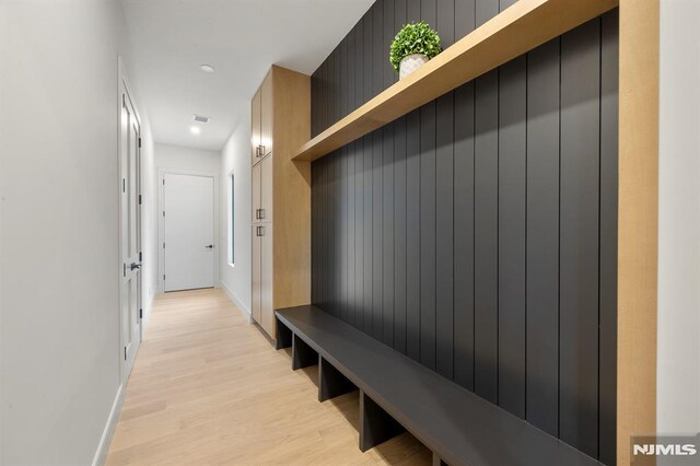 mudroom with light wood-type flooring