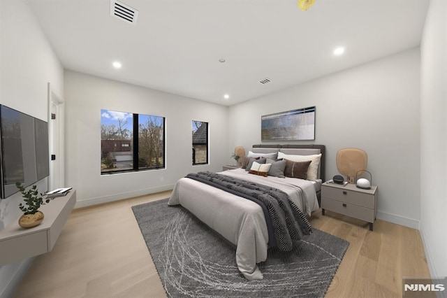 bedroom featuring light hardwood / wood-style floors