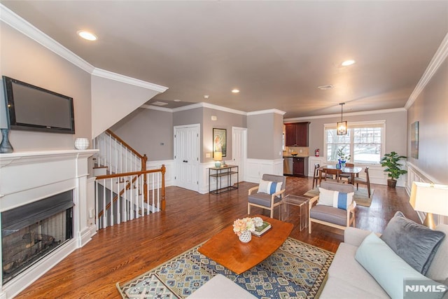 living room featuring crown molding and dark hardwood / wood-style floors