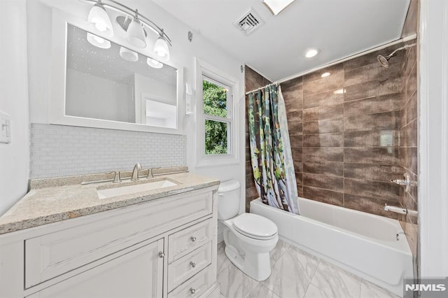 full bathroom with toilet, vanity, shower / bath combo, and tasteful backsplash