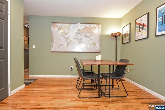 dining space featuring light hardwood / wood-style flooring