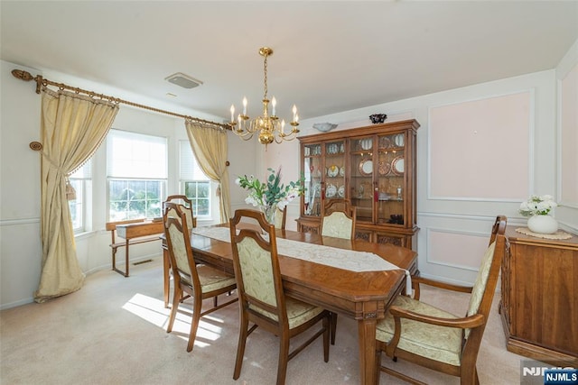 342 Mount Pleasant Ave, Rockaway Township, NJ 07801 - dining area with light carpet and a notable chandelier