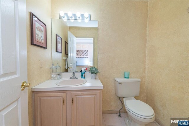 342 Mount Pleasant Ave, Rockaway Township, NJ 07801 - bathroom featuring tile patterned flooring, vanity, and toilet