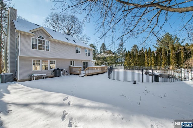 342 Mount Pleasant Ave, Rockaway Township, NJ 07801 - snow covered rear of property featuring a jacuzzi and central AC