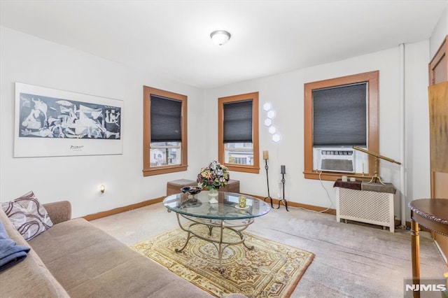 carpeted living room featuring cooling unit