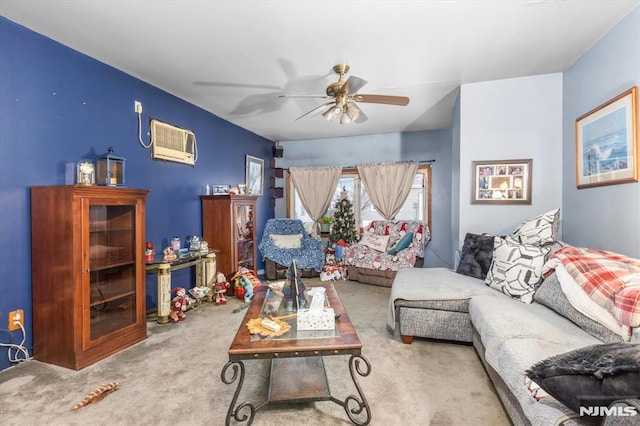 carpeted living room featuring a wall mounted air conditioner and ceiling fan