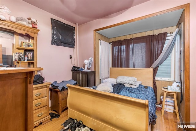 bedroom with light hardwood / wood-style flooring