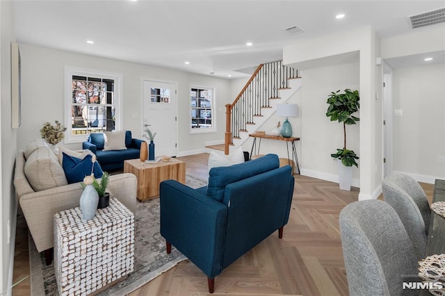 living room with light parquet floors