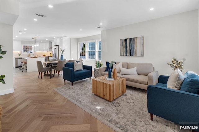 living room featuring light parquet floors