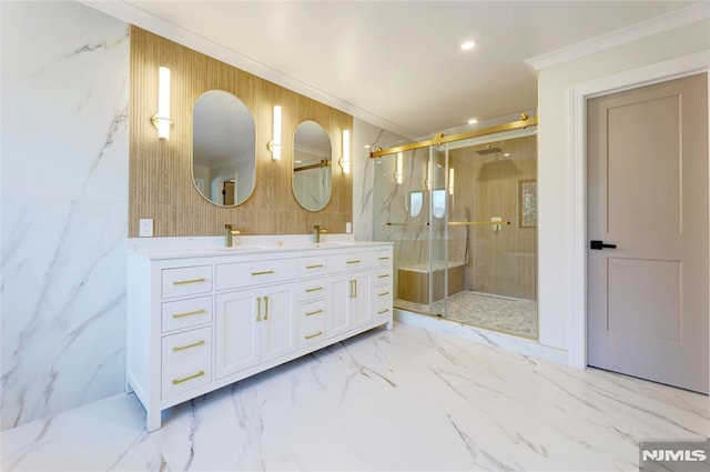 bathroom featuring ornamental molding, a shower with shower door, and vanity