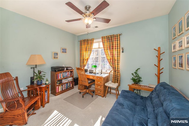 office area with ceiling fan and light colored carpet