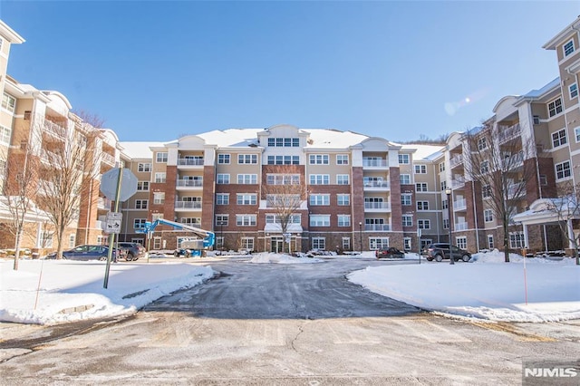 view of snow covered property