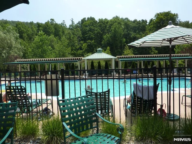 view of pool with a gazebo