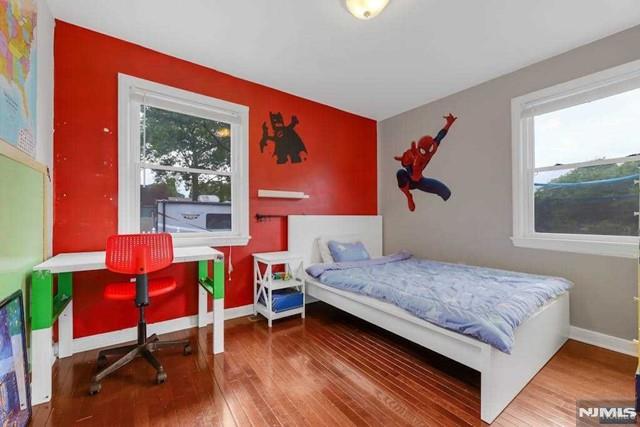 bedroom featuring hardwood / wood-style flooring