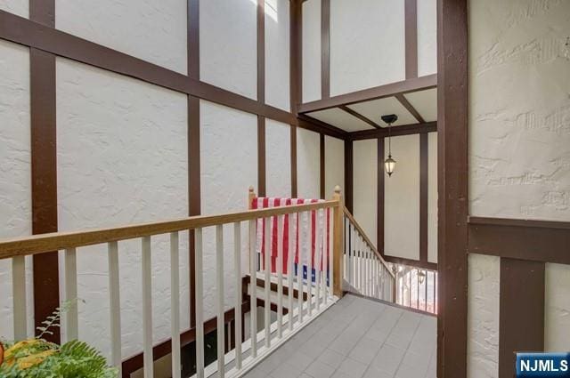 hallway with a textured wall