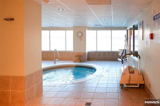 view of pool with an indoor in ground hot tub