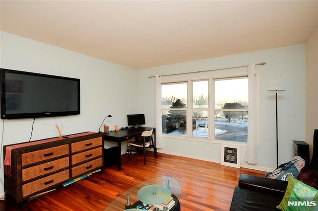 office area with wood-type flooring