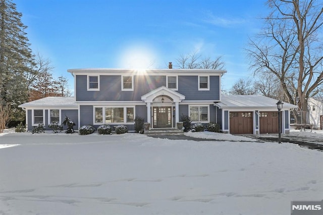 view of front property with a garage