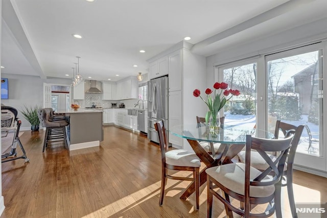 dining room featuring light hardwood / wood-style flooring