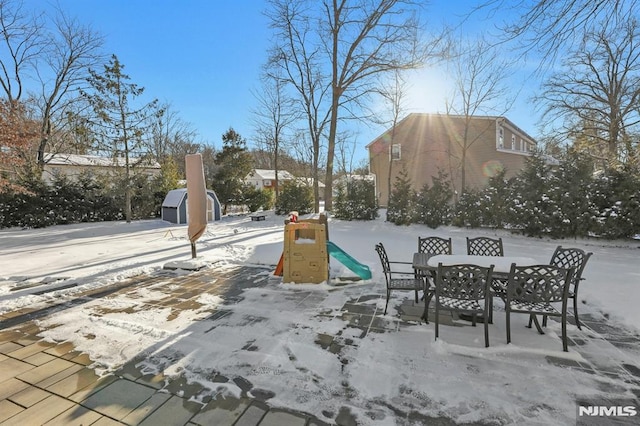 view of snow covered deck