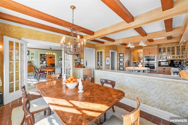 dining room featuring a notable chandelier, french doors, and beam ceiling