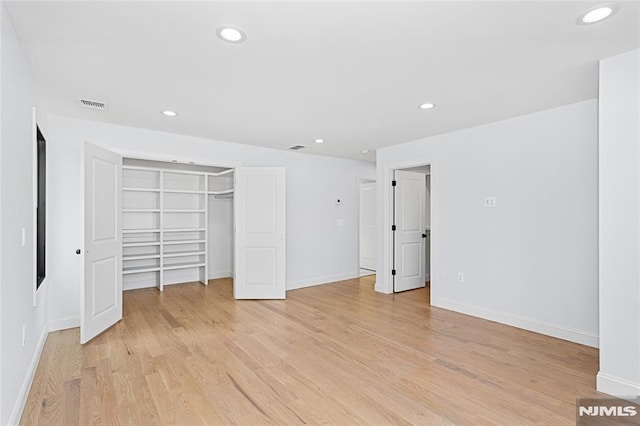 unfurnished bedroom featuring light hardwood / wood-style floors