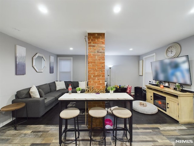 living room with decorative columns