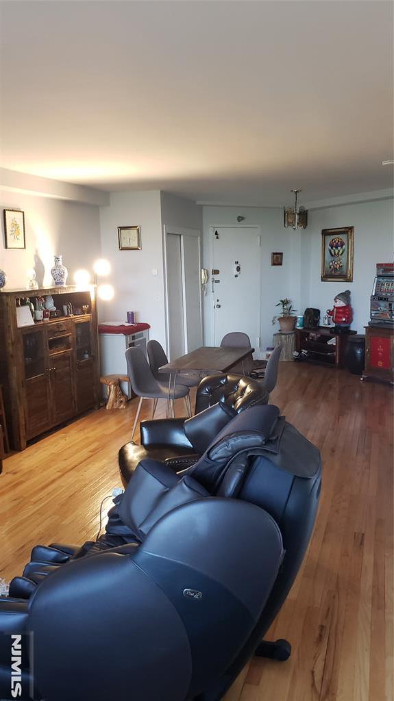 living room with hardwood / wood-style floors