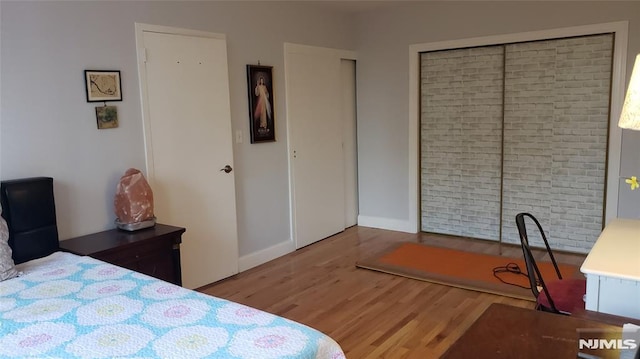 bedroom featuring hardwood / wood-style flooring