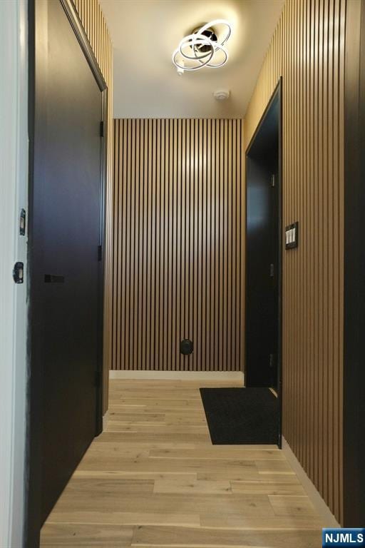 hallway featuring wood-type flooring