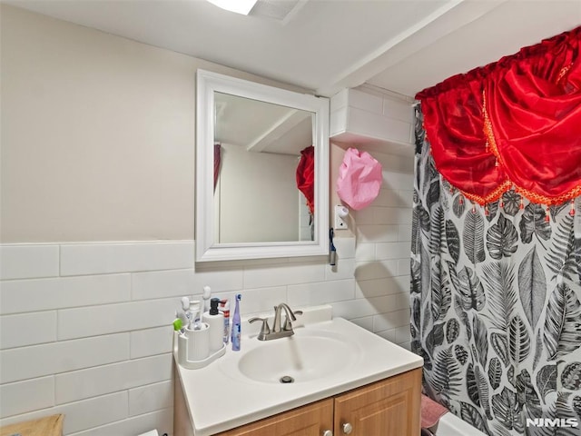 bathroom with vanity and a shower with curtain