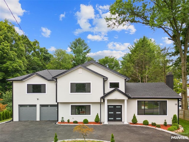 view of front of property featuring a garage