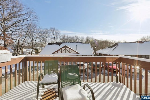 view of snow covered deck