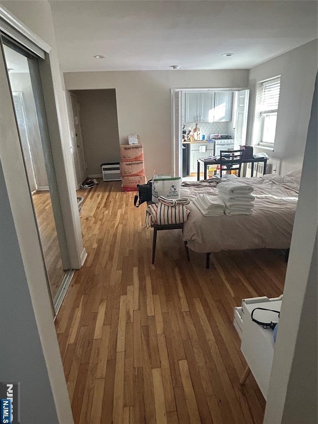 bedroom featuring wood-type flooring