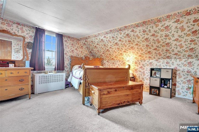 bedroom featuring light colored carpet