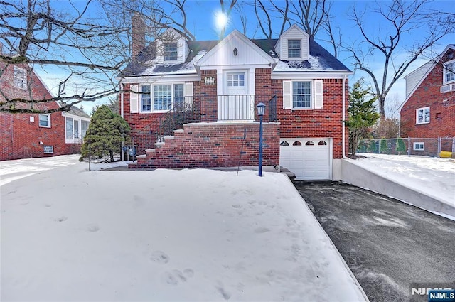 view of front of property featuring a garage