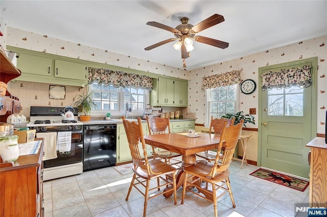 dining area featuring light tile patterned floors, a wealth of natural light, and ceiling fan