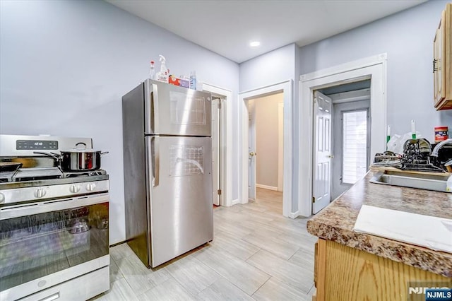 kitchen with stainless steel appliances and sink