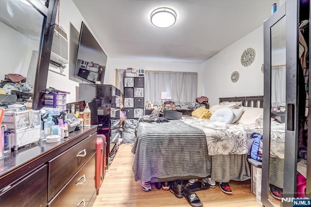 bedroom featuring light hardwood / wood-style floors