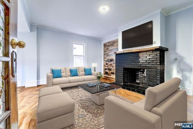 living room with parquet floors, ornamental molding, and a brick fireplace