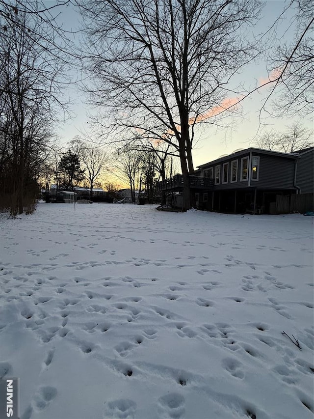 view of yard covered in snow