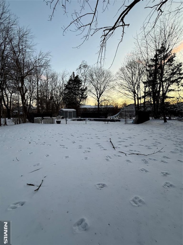 view of yard covered in snow