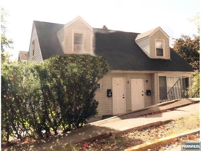 view of new england style home