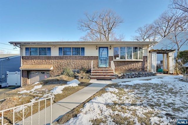 view of front of home with a garage