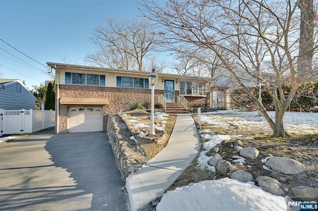 view of front of home with a garage