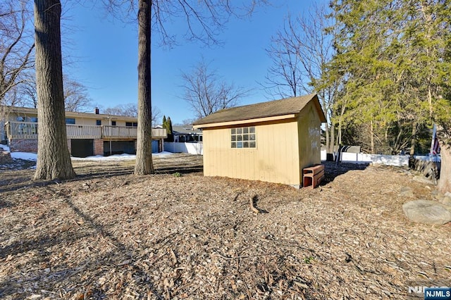 view of home's exterior featuring an outdoor structure