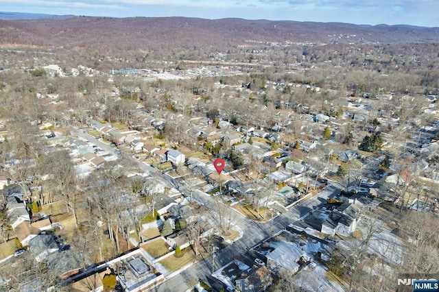 drone / aerial view featuring a mountain view